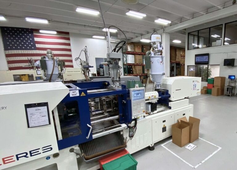 Injection molding press on the Plastimold production floor